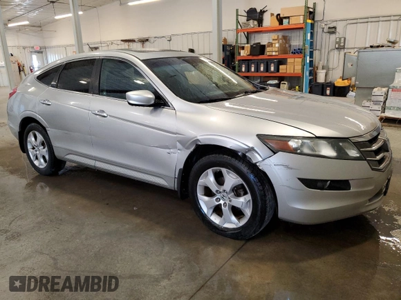 2010 Honda Crosstour EX-L z VIN 5J6TF1H50AL010880, wystawiony jako Copart lot #55805665 z przebiegiem 116 323 mil mil oraz Szkody całkowita. Historia ofert i sprzedaży dostępna na DreamBid. Obrazek 4.