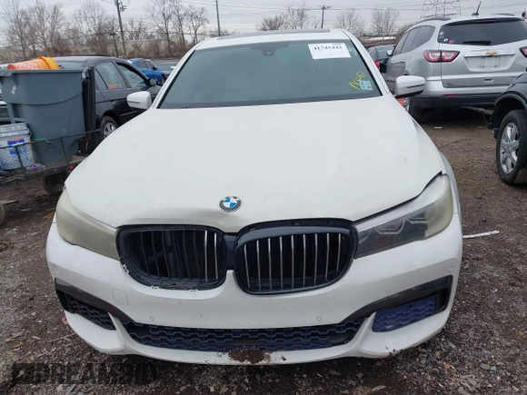 2016 BMW 7 Series 740i with VIN WBA7E2C50GG714647, listed as a IAAI auction lot 41745442 with 134,399 mi miles and . Bid and sale history available at carsss.com. Image 13.