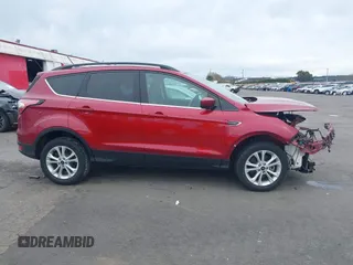 2018 Ford Escape SE z VIN 1FMCU9GD8JUB14803, wystawiony jako IAAI lot #41842056 z przebiegiem 50 712 mil mil oraz . Historia ofert i sprzedaży dostępna na DreamBid. Obrazek 14.