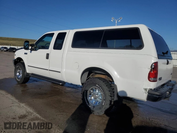 2002 Ford Super Duty F-250 XL with VIN 1FTNX21S12ED39336, listed as a Copart auction lot 51344865 with 125,512 mi miles and Salvage Title. Bid and sale history available at carsss.com. Image 2.