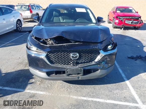 2023 Mazda CX-30 S Select with VIN 3MVDMBBM8PM514475, listed as a IAAI auction lot 41664456 with 33,076 mi miles and . Bid and sale history available at DreamBid. Image 6.