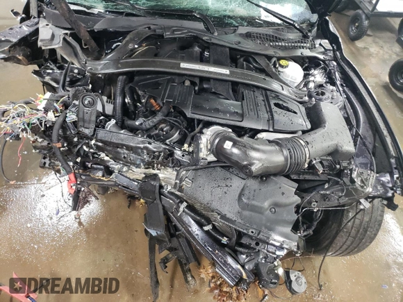 2021 Ford Mustang GT z VIN 1FA6P8CF6M5121909, wystawiony jako Copart lot #51241585 z przebiegiem Nie podano mil oraz Nie do naprawy. Historia ofert i sprzedaży dostępna na DreamBid. Obrazek 11.