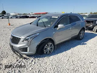 2023 Cadillac XT5 FWD Premium Luxury with VIN 1GYKNCRS6PZ100071, listed as a Copart auction lot 76248224 with 25,613 mi miles and Salvage Title. Bid and sale history available at carsss.com. Image 1.
