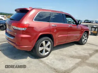 2015 Jeep Grand Cherokee Overland with VIN 1C4RJECG3FC686536, listed as a Copart auction lot 61058215 with 132,282 mi miles and Salvage title. Bid and sale history available at DreamBid. Image 3.