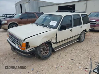 1991 Ford Explorer XL z VIN 1FMDU32X5MUA21535, wystawiony jako IAAI lot #42370194 z przebiegiem 83 911 mil mil oraz . Historia ofert i sprzedaży dostępna na DreamBid. Obrazek 2.