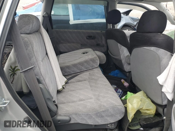 1997 Honda Odyssey z VIN RA21211409, wystawiony jako Copart lot #62449015 z przebiegiem Nie podano mil oraz Szkoda całkowita • Salvage title. Historia ofert i sprzedaży dostępna na DreamBid. Obrazek 11.