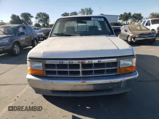 1992 Dodge Dakota z VIN 1B7FL23X0NS581033, wystawiony jako Copart lot #72280124 z przebiegiem 101 559 mil mil oraz Czysty tytuł • Clean title. Historia ofert i sprzedaży dostępna na DreamBid. Obrazek 5.