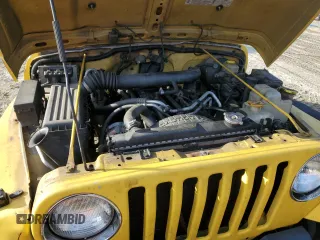 2001 Jeep Wrangler Sport with VIN 1J4FA49S21P312522, listed as a Copart auction lot 54698935 with 201,199 mi miles and Salvage Title. Bid and sale history available at carsss.com. Image 12.