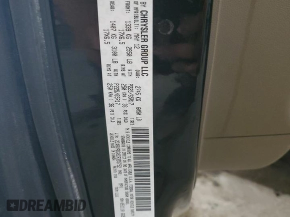 2012 Volkswagen Routan z VIN 2C4RVADG0CR355752, wystawiony jako Copart lot #53687155 z przebiegiem 132 903 mil mil oraz Szkoda całkowita • Salvage title. Historia ofert i sprzedaży dostępna na DreamBid. Obrazek 13.