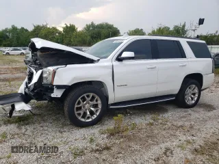 2016 GMC Yukon SLT with VIN 1GKS2BKC0GR265761, listed as a Copart auction lot 65645484 with 130,352 mi miles and Salvage Title. Bid and sale history available at carsss.com. Image 1.