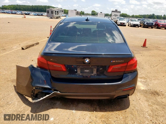 2018 BMW 5 Series M550i xDrive with VIN WBAJB9C54JB286450, listed as a Copart auction lot 61232125 with 88,479 mi miles and Salvage title. Bid and sale history available at DreamBid. Image 6.