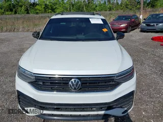 2023 Volkswagen Tiguan SE R-Line Black with VIN 3VVCB7AX9PM042025, listed as a IAAI auction lot 41913943 with 114,097 mi miles and . Bid and sale history available at DreamBid. Image 6.
