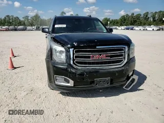 2016 GMC Yukon XL SLE with VIN 1GKS1FKC5GR252742, listed as a Copart auction lot 77618964 with 68,213 mi miles and Salvage Title. Bid and sale history available at carsss.com. Image 12.