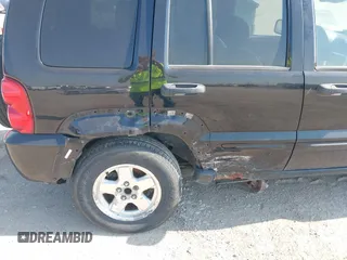 2003 Jeep Liberty Limited with VIN 1J4GL58K43W621052, listed as a IAAI auction lot 42221352 with 156,836 mi miles and . Bid and sale history available at DreamBid. Image 6.