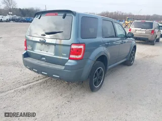 2011 Ford Escape XLT with VIN 1FMCU9DG9BKC38929, listed as a IAAI auction lot 41784854 with 216,201 mi miles. Bid and sale history available at carsss.com. Image 4.