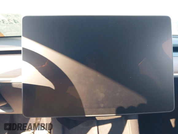2023 Tesla Model Y Long Range with VIN 7SAYGDEE0PF671726, listed as a IAAI auction lot 42393616 with Not provided miles and . Bid and sale history available at DreamBid. Image 18.