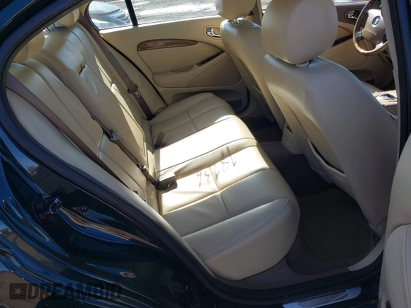 2005 Jaguar S-Type with VIN SAJWA01T95FN51551, listed as a IAAI auction lot 41637854 with 90,075 mi miles and . Bid and sale history available at DreamBid. Image 8.