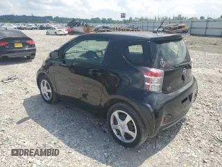 2014 Scion iQ with VIN JTNJJXB07EJ028558, listed as a Copart auction lot 64745345 with 112,221 mi miles and Clean title. Bid and sale history available at DreamBid. Image 2.