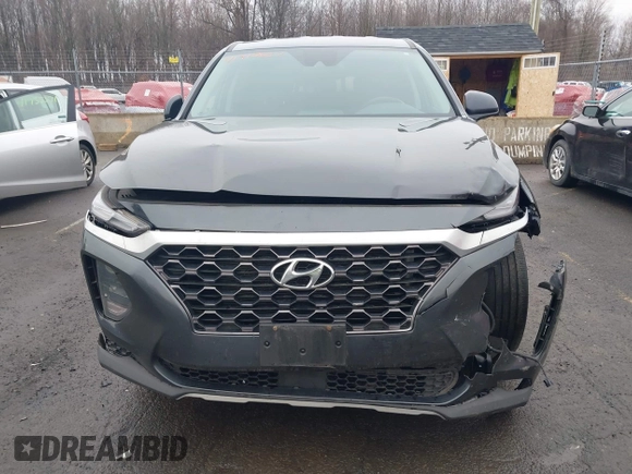 2020 Hyundai Santa Fe SE with VIN 5NMS2CAD8LH258275, listed as a IAAI auction lot 41912687 with 80,467 mi miles and . Bid and sale history available at DreamBid. Image 13.