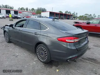 2018 Ford Fusion Titanium with VIN 3FA6P0D96JR155769, listed as a IAAI auction lot 41853177 with 87,839 mi miles. Bid and sale history available at carsss.com. Image 3.