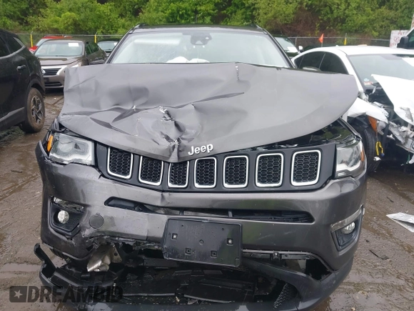 2018 Jeep Compass Latitude with VIN 3C4NJDBB5JT337129, listed as a IAAI auction lot 42330631 with 126,827 mi miles and . Bid and sale history available at DreamBid. Image 11.