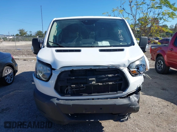 2018 Ford Transit with VIN 1FTYR1YG0JKA80745, listed as a IAAI auction lot 41351116 with 167,186 mi miles and . Bid and sale history available at DreamBid. Image 12.