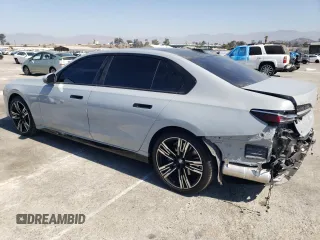 2023 BMW 7 Series 740i with VIN WBA23EH09PCM67327, listed as a Copart auction lot 73387174 with 18,228 mi miles and Salvage Title. Bid and sale history available at carsss.com. Image 2.