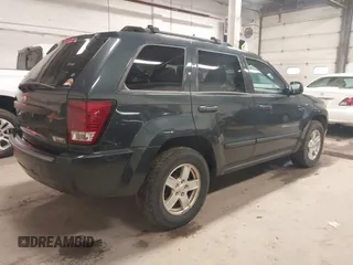 2007 Jeep Grand Cherokee Laredo with VIN 1J8GS48K87C615693, listed as a IAAI auction lot 41949521 with 206,058 mi miles. Bid and sale history available at carsss.com. Image 4.