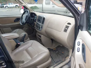 2004 Ford Escape Limited with VIN 1FMCU94114KB51234, listed as a IAAI auction lot 42055474 with 88,772 mi miles and . Bid and sale history available at DreamBid. Image 5.