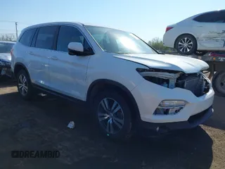 2016 Honda Pilot EX-L with VIN 5FNYF6H5XGB066295, listed as a IAAI auction lot 42063630 with 156,734 mi miles. Bid and sale history available at carsss.com. Image 1.