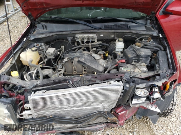 2008 Ford Escape Limited z VIN 1FMCU94108KA14209, wystawiony jako Copart lot #57857305 z przebiegiem 186 893 mil mil oraz Szkoda całkowita • Salvage title. Historia ofert i sprzedaży dostępna na DreamBid. Obrazek 12.