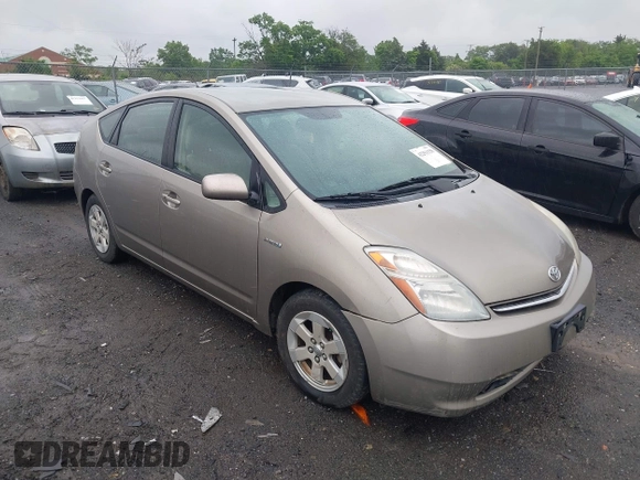 2006 Toyota Prius z VIN JTDKB20U067517414, wystawiony jako IAAI lot #42251158 z przebiegiem 233 266 mil mil oraz . Historia ofert i sprzedaży dostępna na DreamBid. Obrazek 1.