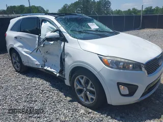 2017 Kia Sorento SXL z VIN 5XYPK4A59HG312155, wystawiony jako IAAI lot #42130190 z przebiegiem 140 287 mil mil oraz . Historia ofert i sprzedaży dostępna na DreamBid. Obrazek 1.