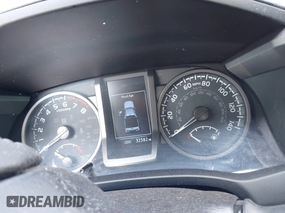 2023 Toyota Tacoma SR with VIN 3TMCZ5AN1PM581266, listed as a IAAI auction lot 42371395 with 32,582 mi miles and . Bid and sale history available at DreamBid. Image 7.