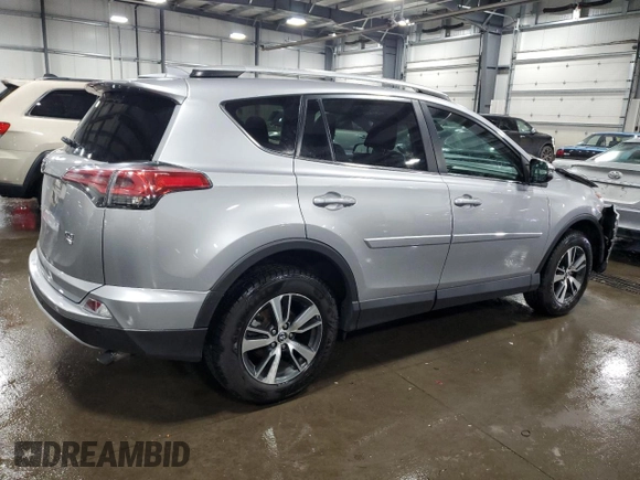 2016 Toyota RAV4 XLE with VIN 2T3RFREV9GW463274, listed as a Copart auction lot 59784805 with 99,138 mi miles and Salvage title. Bid and sale history available at DreamBid. Image 3.