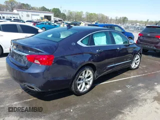 2018 Chevrolet Impala Premier with VIN 2G1125S35J9150415, listed as a IAAI auction lot 41873102 with 106,280 mi miles and . Bid and sale history available at DreamBid. Image 4.