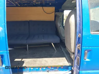 2003 Ford Econoline Cargo with VIN 1FTNE24223HA50404, listed as a IAAI auction lot 42087224 with 210,418 mi miles. Bid and sale history available at carsss.com. Image 8.