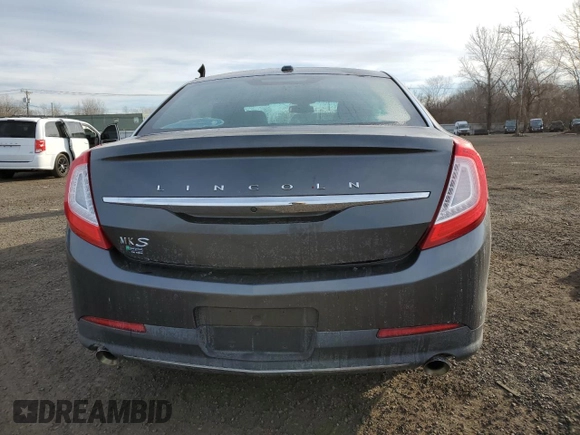 2016 Lincoln MKS с VIN 1LNHL9DK0GG601111, выставлен на аукционе Copart как лот 88354865 с пробегом 96 298 миль миль и Списание • Salvage title. История ставок и продаж доступна на DreamBid. Изображение 6.