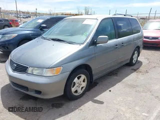 2000 Honda Odyssey EX with VIN 2HKRL1864YH605537, listed as a IAAI auction lot 41972983 with 203,500 mi miles and . Bid and sale history available at DreamBid. Image 2.