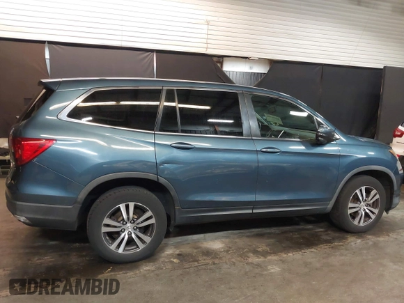 2016 Honda Pilot EX-L with VIN 5FNYF6H54GB105964, listed as a IAAI auction lot 42006560 with 110,466 mi miles. Bid and sale history available at carsss.com. Image 13.