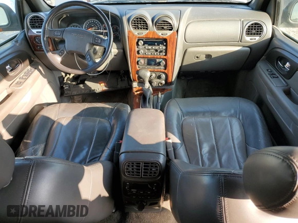 2002 GMC Envoy SLT with VIN 1GKDT13S322420861, listed as a Copart auction lot 63408164 with 250,167 mi miles and Salvage Title. Bid and sale history available at DreamBid. Image 8.
