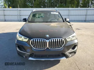 2021 BMW X1 sDrive28i z VIN WBXJG7C02M5U22447, wystawiony jako Copart lot #52927285 z przebiegiem 45 128 mil mil oraz Szkody całkowita. Historia ofert i sprzedaży dostępna na DreamBid. Obrazek 5.