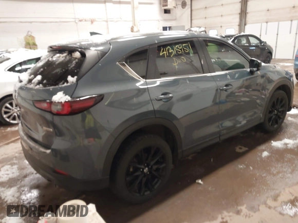 2023 Mazda CX-5 2.5 S Carbon Edition with VIN JM3KFBCM2P0191682, listed as a IAAI auction lot 41315951 with 36,285 mi miles. Bid and sale history available at carsss.com. Image 4.