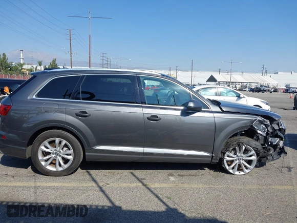 2019 Audi Q7 Premium with VIN WA1AHAF71KD016656, listed as a IAAI auction lot 41545261 with 63,394 mi miles and . Bid and sale history available at DreamBid. Image 12.