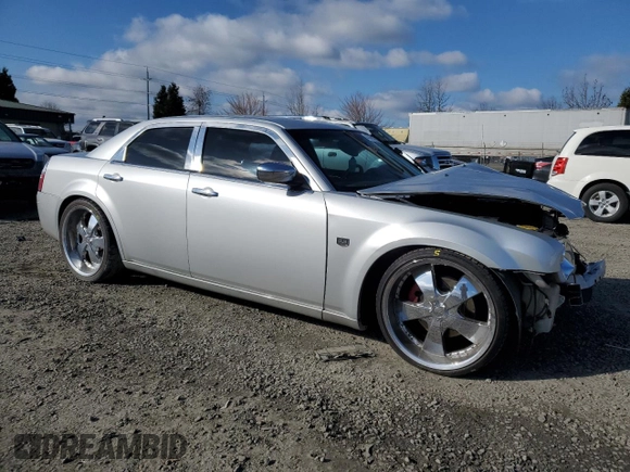 2005 Chrysler 300 C with VIN 2C3AA63H15H674199, listed as a Copart auction lot 47628215 with 154,052 mi miles and Salvage Title. Bid and sale history available at DreamBid. Image 4.