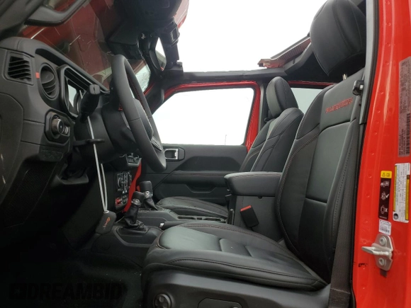 2024 Jeep Wrangler Rubicon X with VIN 1C4RJXFG5RW297553, listed as a Copart auction lot 85009074 with 838 mi miles and Salvage title. Bid and sale history available at DreamBid. Image 7.