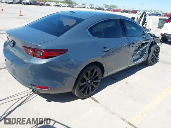 2022 Mazda 3 2.5 Turbo z VIN 3MZBPBAY8NM308426, wystawiony jako IAAI lot #41808563 z przebiegiem 44 693 mil mil oraz . Historia ofert i sprzedaży dostępna na DreamBid. Obrazek 4.