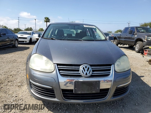 2009 Volkswagen Jetta S с VIN 3VWJZ71K49M014297, выставлен на аукционе Copart как лот 57055395 с пробегом 129 029 миль миль и Чистый • Clean title. История ставок и продаж доступна на DreamBid. Изображение 5.