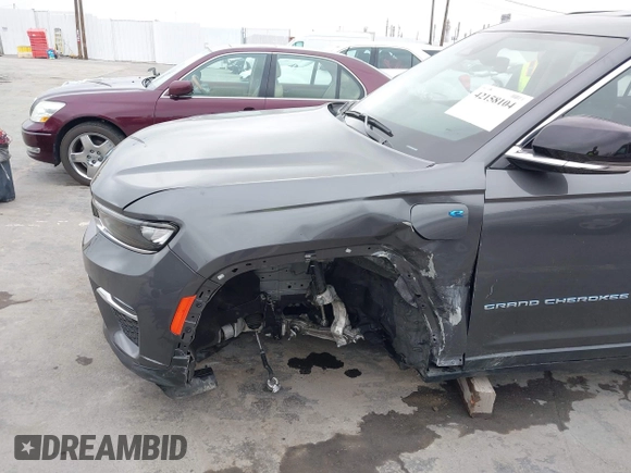 2022 Jeep Grand Cherokee with VIN 1C4RJYB68N8748802, listed as a IAAI auction lot 42158104 with 28,227 mi miles and . Bid and sale history available at DreamBid. Image 6.