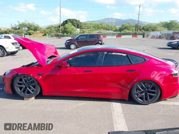 2022 Tesla Model S Plaid with VIN 5YJSA1E61NF460253, listed as a IAAI auction lot 40328727 with Not provided miles and . Bid and sale history available at DreamBid. Image 15.